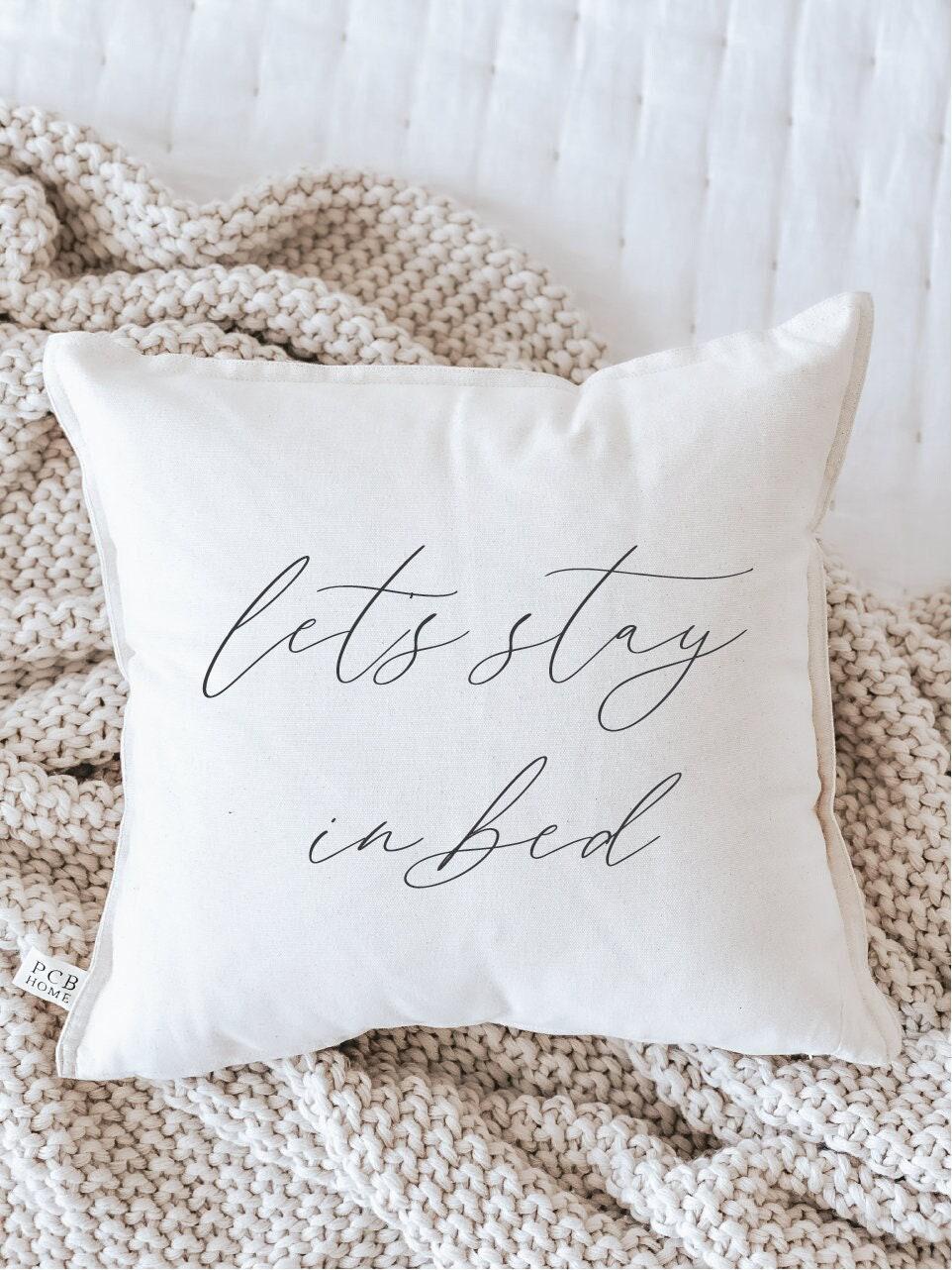 Let's Stay In Bed Throw Pillow: Calligraphy Home Decor